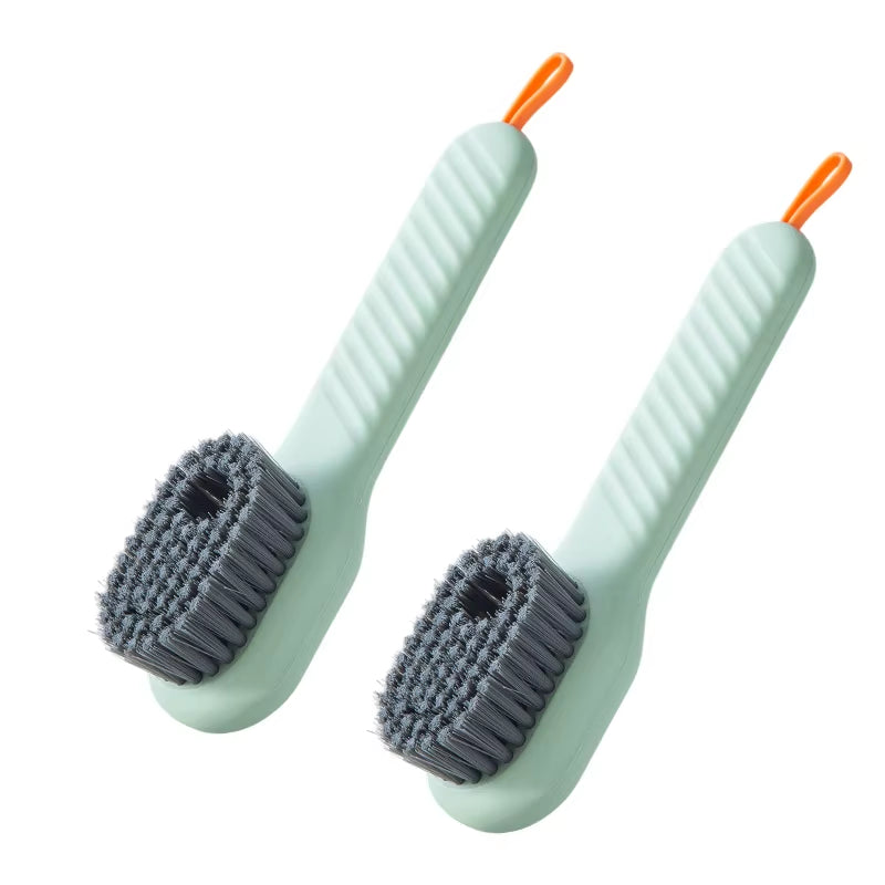 Soft bristle brush with soap container