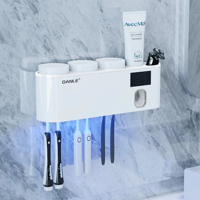 Smart UV toothbrush sanitizer with toothpaste dispenser