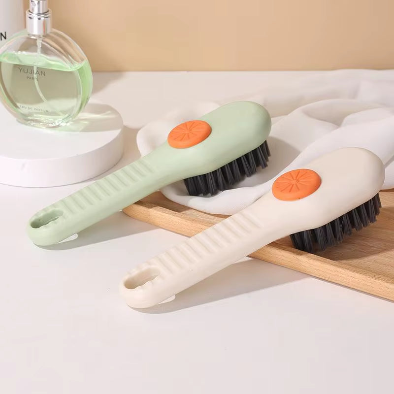 Soft bristle brush with soap container