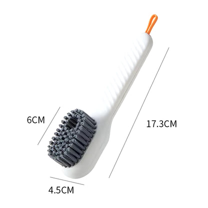 Soft bristle brush with soap container